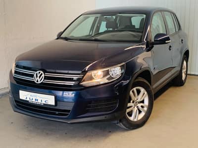 Volkswagen Tiguan Trend & Fun BMT°AHK°PDC°2.Hd°8xbereift° — slika 1